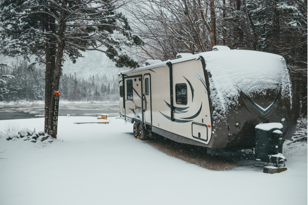 photo of rv trailer in the snow at a nice rv park
